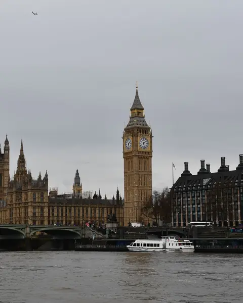 Big Ben, the Houses of Parliament and Westminster Bridge over the River Thames in London